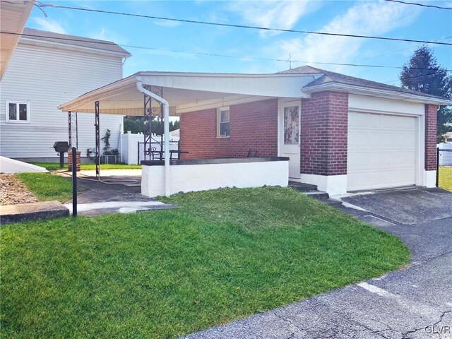 view of home's exterior with a lawn and a garage