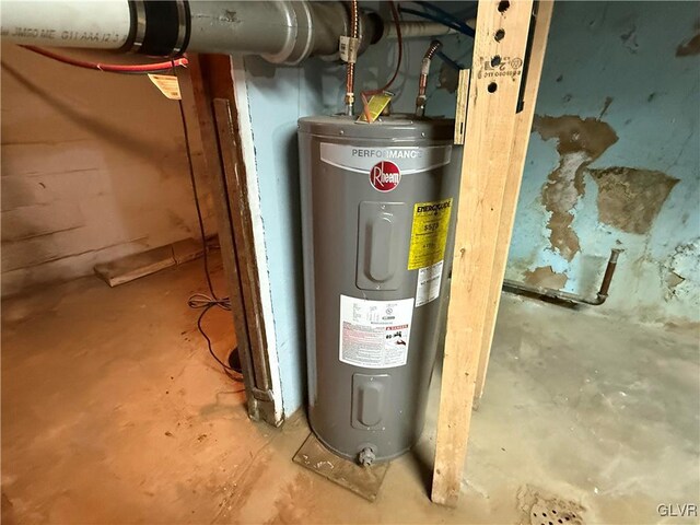 utility room featuring electric water heater