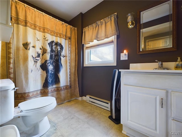 bathroom featuring vanity, toilet, and a baseboard radiator