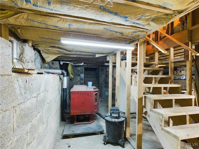 basement featuring a wood stove