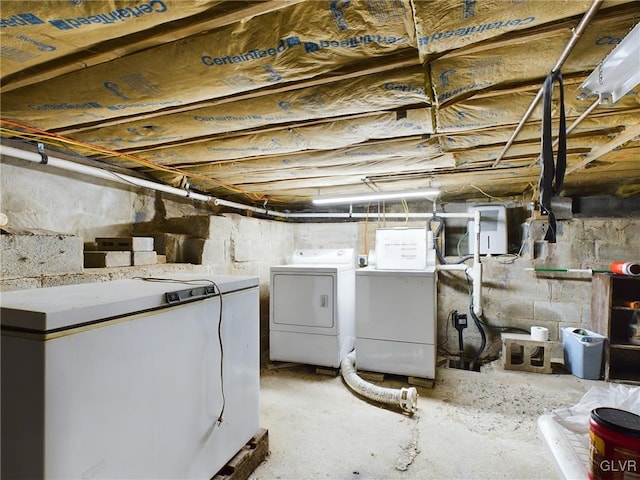 basement featuring washer and dryer