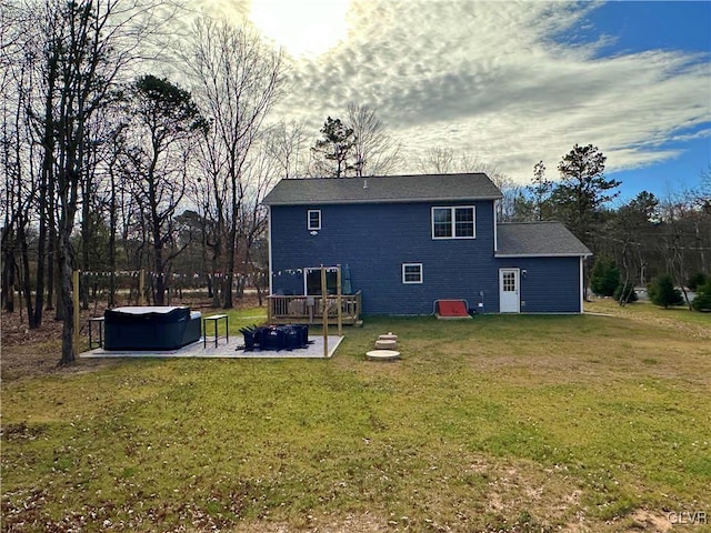 back of house with a yard and a patio area