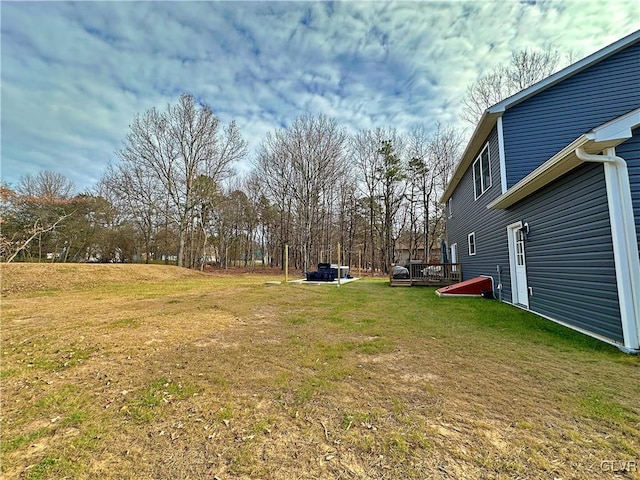 view of yard featuring a deck