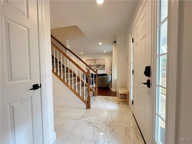 foyer entrance featuring light wood-type flooring