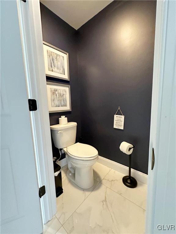 bathroom featuring toilet