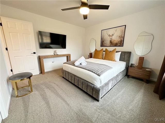 bedroom with ceiling fan and carpet floors