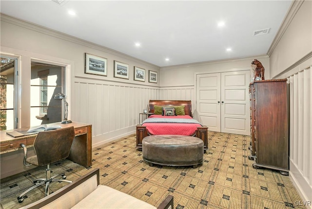 bedroom featuring a closet and ornamental molding