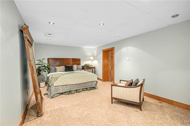 bedroom with light colored carpet