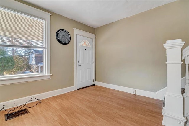 foyer entrance featuring light hardwood / wood-style floors