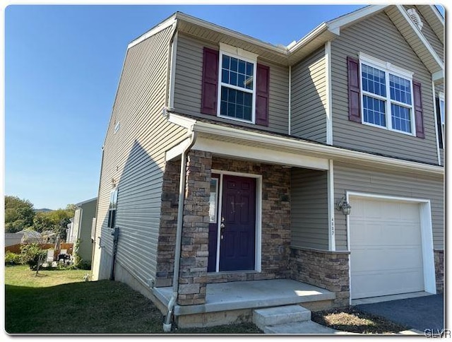 view of front of home featuring a garage