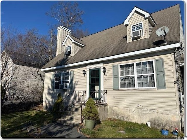 view of new england style home