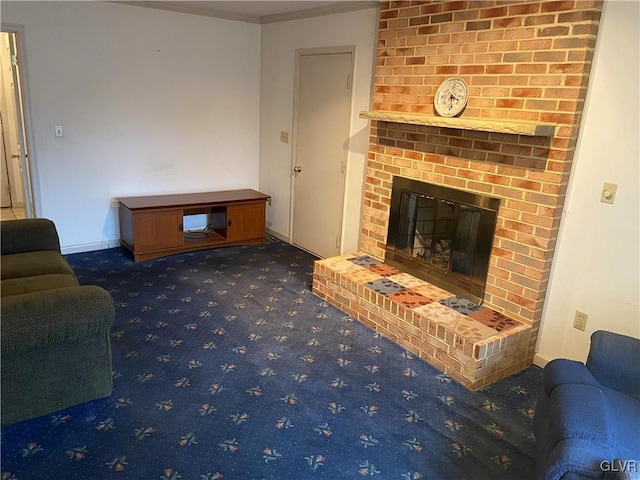 carpeted living room featuring a brick fireplace