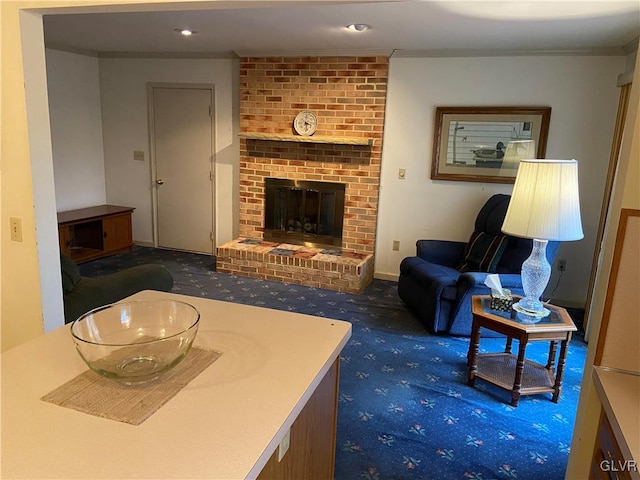 carpeted living room featuring crown molding and a fireplace