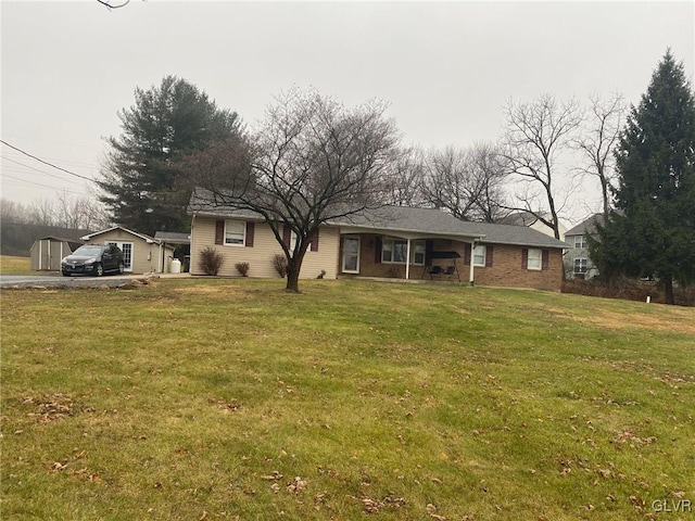 single story home with a front yard