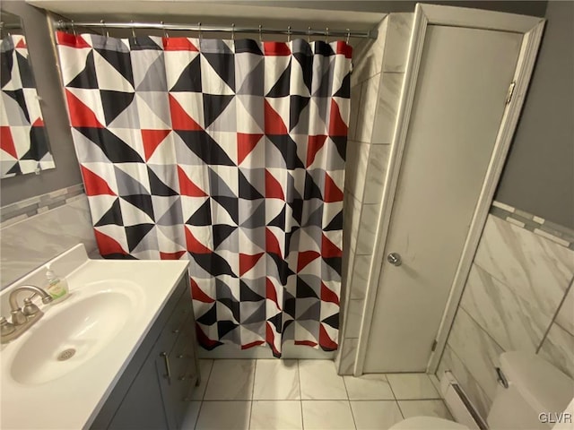 bathroom with vanity, tile walls, tile patterned flooring, toilet, and curtained shower