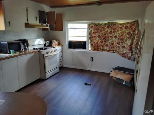 kitchen with white range with gas cooktop, decorative backsplash, white cabinets, and dark hardwood / wood-style floors