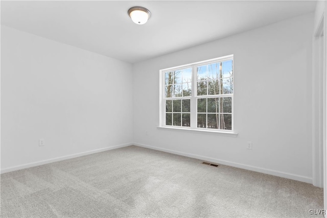 view of carpeted spare room