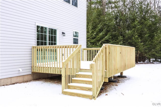 view of snow covered deck