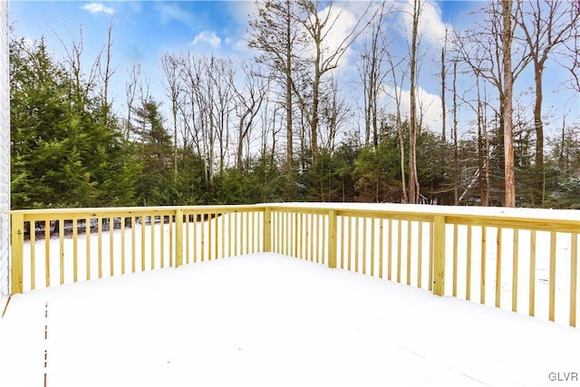 view of snow covered deck