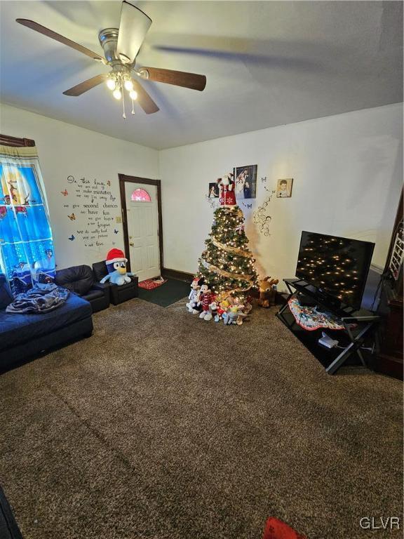 game room featuring carpet and ceiling fan