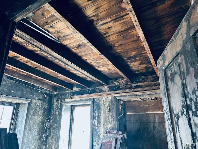 room details with beamed ceiling and wood ceiling