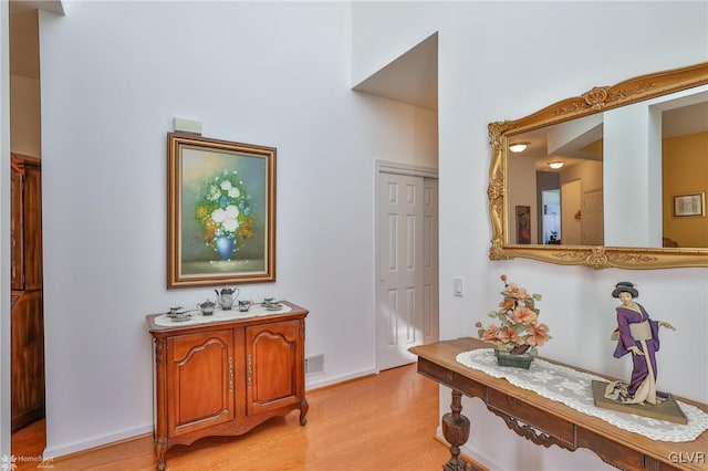 hallway featuring light hardwood / wood-style floors