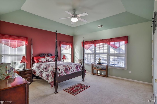 bedroom featuring ceiling fan, light colored carpet, and lofted ceiling