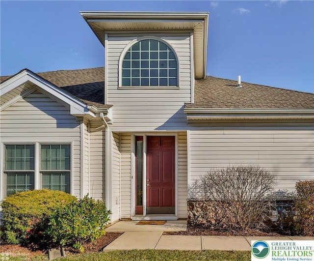 9 Moor Dr, Palmer Twp, PA 18045 - doorway to property with a shingled roof