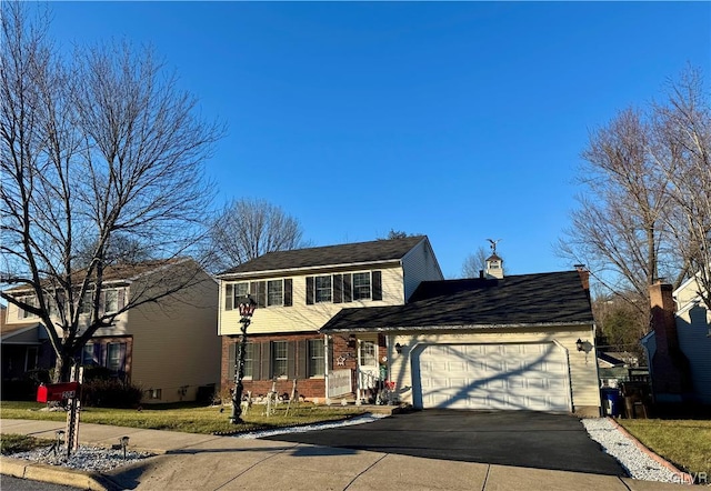 front facade with a garage