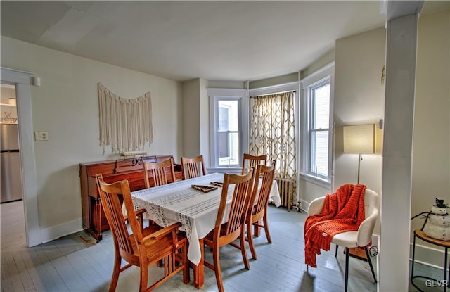 dining area with light hardwood / wood-style flooring