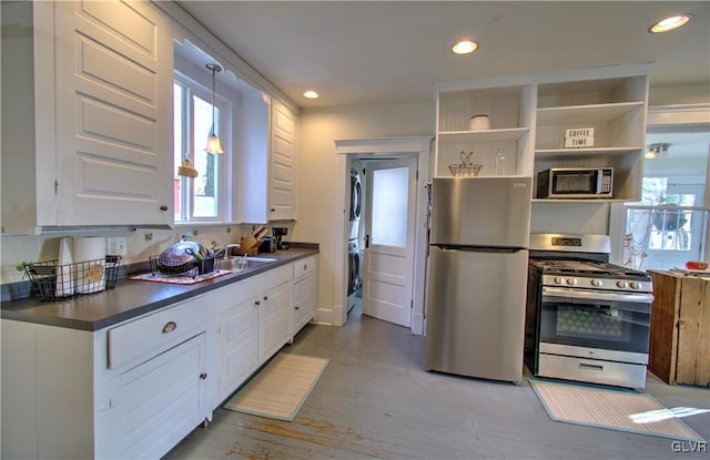 812 Lehigh St, Jim Thorpe Borough, PA 18229 - kitchen with stainless steel appliances, dark countertops, white cabinets, and recessed lighting