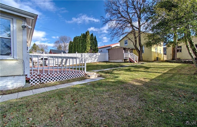 view of yard featuring a deck