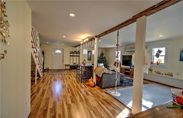 living room with light hardwood / wood-style flooring