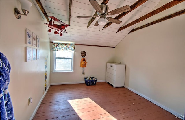 interior space with ceiling fan, hardwood / wood-style floors, and lofted ceiling with beams