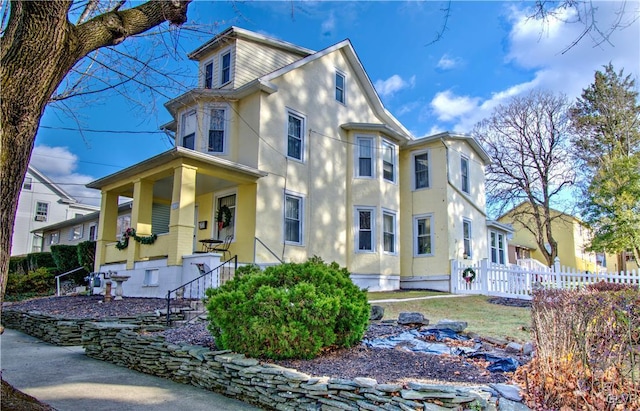 view of front of home featuring covered porch