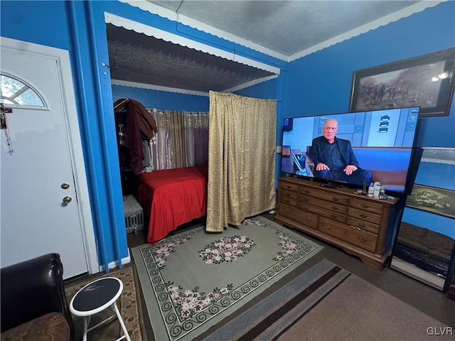 carpeted bedroom featuring ornamental molding