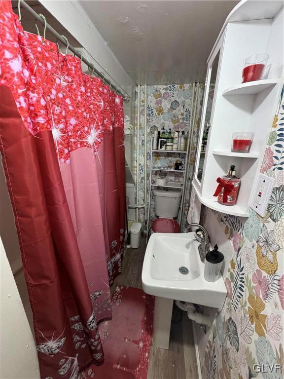 bathroom featuring hardwood / wood-style flooring