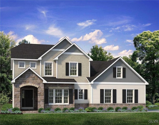 craftsman-style home featuring a front lawn