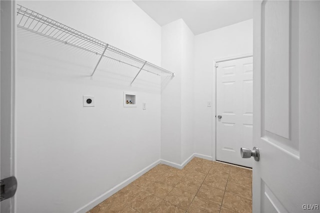 laundry area featuring hookup for a washing machine, light tile patterned floors, and hookup for an electric dryer