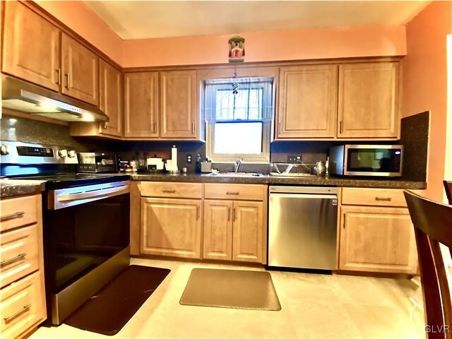 kitchen featuring sink and appliances with stainless steel finishes