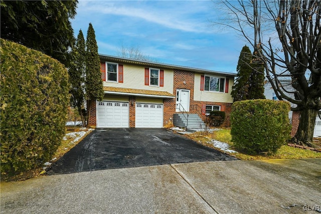 bi-level home featuring a garage