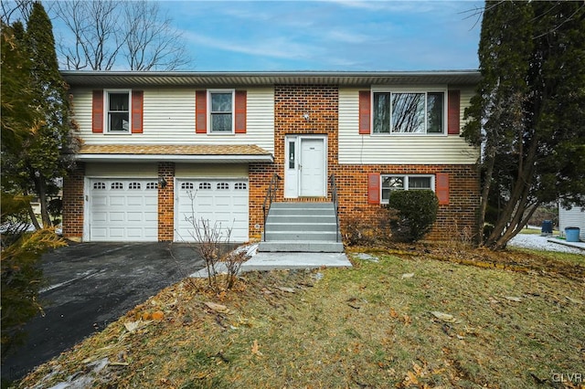 bi-level home featuring a garage