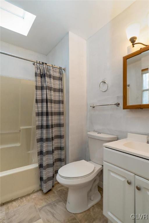 full bathroom with vanity, toilet, shower / tub combo, and a skylight