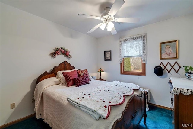 carpeted bedroom with ceiling fan