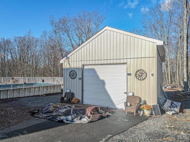 garage featuring a covered pool