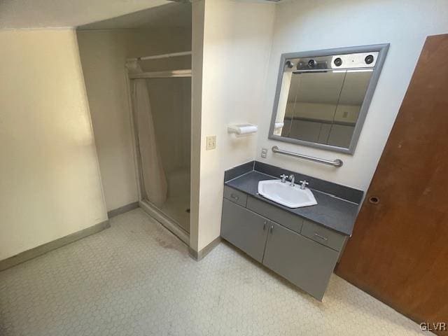 bathroom featuring vanity and walk in shower