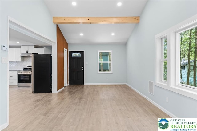 410 Sunset Forest Dr, Pike, PA 18428 - unfurnished living room with beamed ceiling, light wood-style floors, recessed lighting, and baseboards