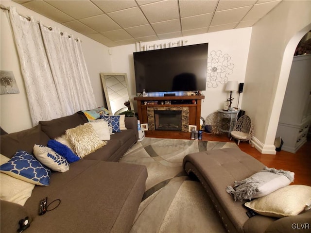 living room featuring a fireplace and hardwood / wood-style flooring