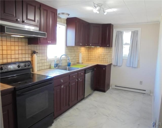 kitchen featuring a wealth of natural light, black electric range, stainless steel dishwasher, and a baseboard heating unit