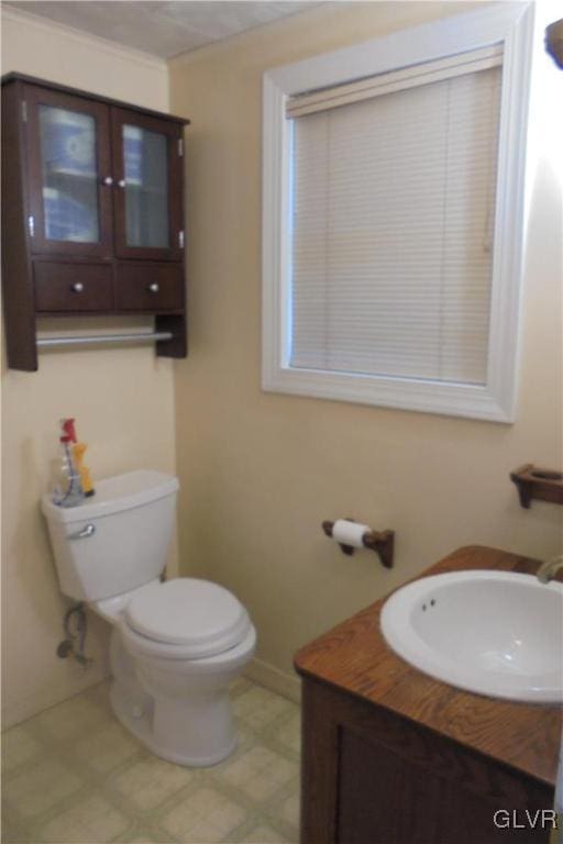 bathroom featuring toilet and sink